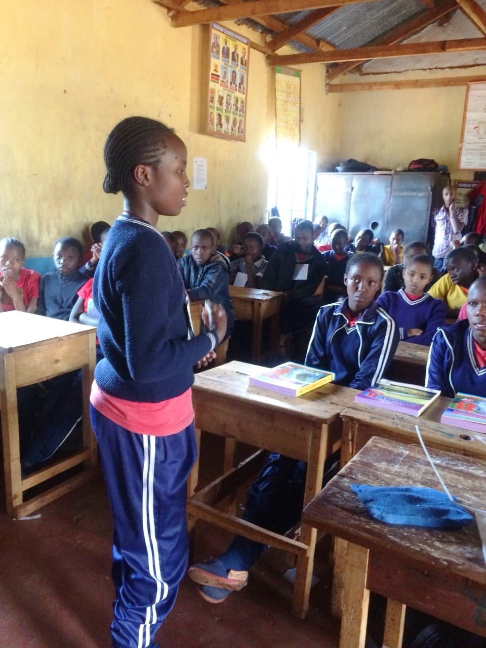 Girls speaking to fellow pupils June 18